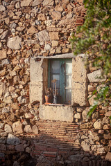 Fototapeta na wymiar Catalonia, Tossa de Mar, quiet coastal town, resort, old fortress, narrow streets of the old town, panorama of the city, red roofs of houses, fortress tower, fortress ruins, cobbled streets, ancient w