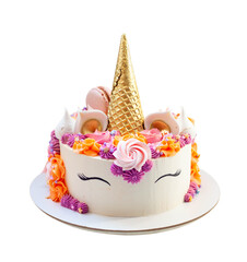 Bright and colorful unicorn cake with beautiful cupcakes decorated with cream cheese frosting, meringue and sprinkles