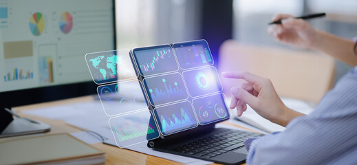 Business hands using digital tablet with business infographic data concept, Analytics data dashboard.