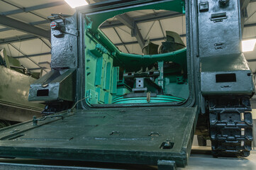 An armored personnel carrier. The rear ramp of the armored personnel carrier for boarding and...