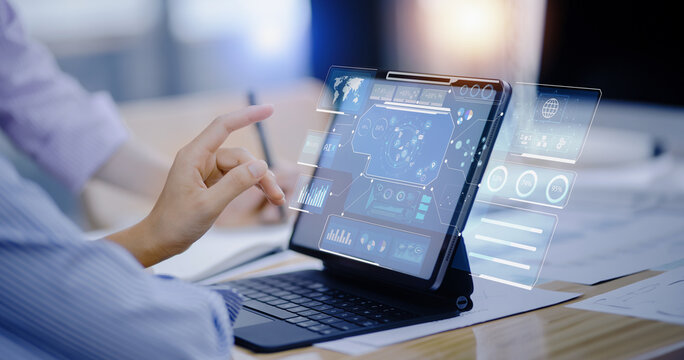 Business hands using digital tablet with business infographic data concept, Analytics data dashboard.