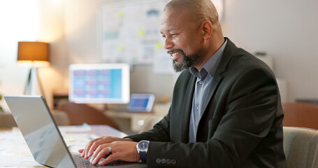 Portrait of happy black man in office, laptop and planning online research for creative project at...
