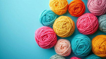 Minimalistic yarn balls background concept with empty space. Vivid color. 