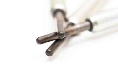 Modern ceramic glow plugs for warming up a diesel engine before starting. White background, isolate. Macro