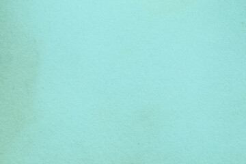 Weathered green mint paper with grainy texture