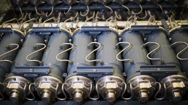 Line Of Gas Centrifuges For Uranium Isotope Separation In Close Up. Uranium Enrichment To Produce Fuel For Nuclear Reactors And Weapons. Electrochemical Integrated Plant. Chemical Factory