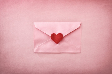 Closed pink envelope with heart cutout on pink textured background - Powered by Adobe