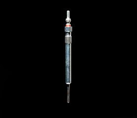 Modern glow plug with a ceramic rod for a diesel engine on a black background, isolate, close-up....