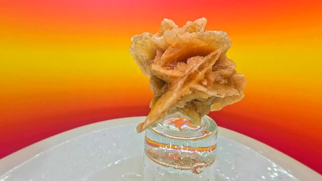 Desert sand rose, barite or gypsum rose is a crystal structure composed of sand grains