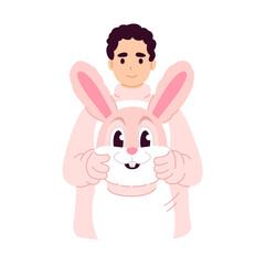 Waist-up portrait of a man in a cute bunny costume, holding the costumes head in his hands.