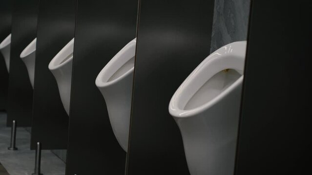 Public toilet with many urinals