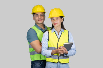 Asian Couple Engineer and Architect giving gestures and expressions on construction field
