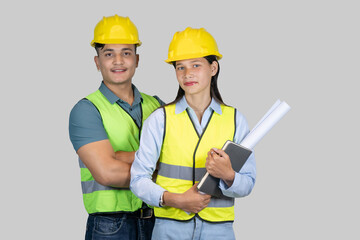 Asian Couple Engineer & Architect gives gestures and expressions on construction field with charts