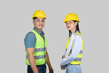 Asian Couple Engineer and Architect giving gestures and expressions on construction field