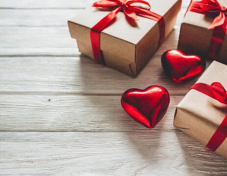 Valentine's Surprise - Gift Boxes with Ribbons and Romantic Red Hearts on white. Copy space