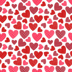 Seamless vector pattern of glazed candies in the shape of red and pink hearts on a white background for packaging, fabric, wallpaper for the holidays Valentine's Day, wedding, birthday