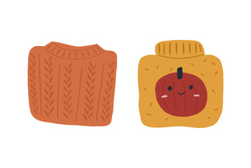 Cute hand drawn folded sweaters, cartoon flat vector illustration isolated on white background. Concept of sweater weather. Warm autumn sweater knitted with cheerful pumpkin.