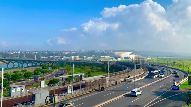 4K video of Modern tram passing by the Bou Regreg river and Scenic view of old city of oudaya with a view over the Grand Theatre of the capital city of Morocco, RABAT