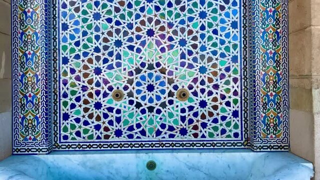 4k video shot of traditional tap water decorated with patterns - Morocco