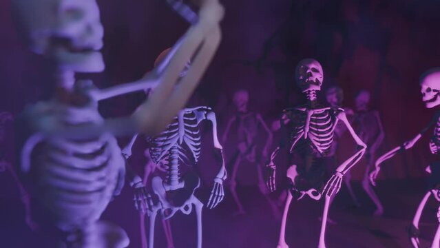 Skeleton DJ at the mixing console surrounded by dancing skeletons in a club atmosphere with colourful lighting and smoke effect. Halloween party.