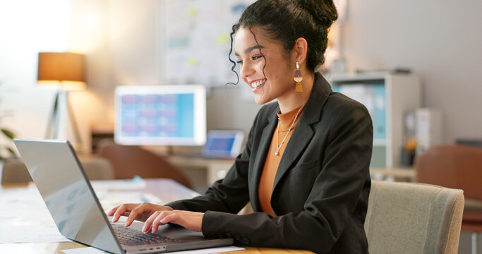 Happy Businesswoman In Office, Typing On Laptop And Planning Online Research For Creative Project At Digital Agency. Internet, Website And Networking, Woman With Smile And Computer For Email Review.