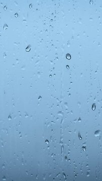 Rain drops droplets on window glass