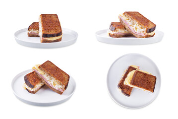 Reuben sandwich with ham, sauerkraut and cheese on a white isolated background