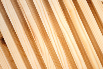 Wooden blocks lie diagonally. View from above. Background. Natural building materials. Ecologically pure.