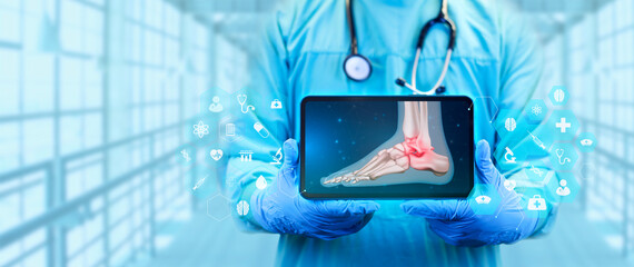 The doctor shows the x-ray of the foot bone in digital format, through a tablet. Foot sprain,...