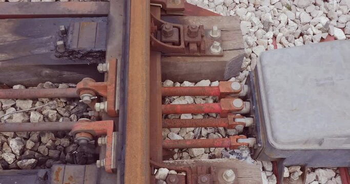 Close-up view of a motorized switch on railway track switches