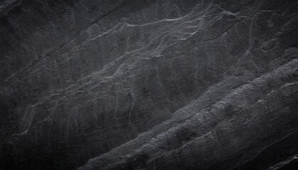 dark grey black slate background or natural stone texture