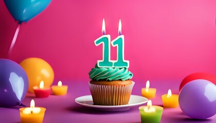 Birthday cupcake with burning lit candle with number 11. Number eleven for eleven years or eleventh anniversary.