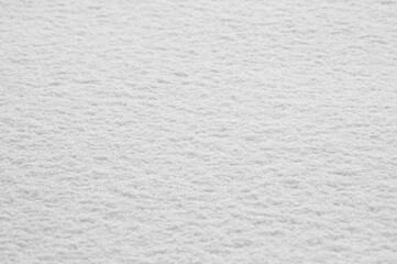 white background, photo shows snow close-up