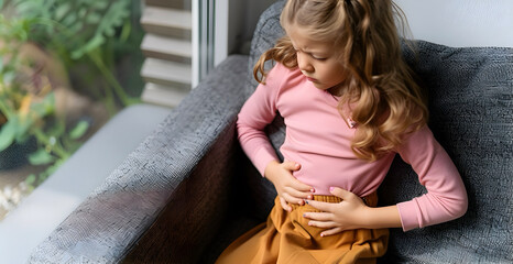 Caucasian little girl suffering from abdominal pain
