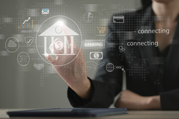 Businesswoman hand-holding banking and technology icons. Facilitating the growth of the banking sector, financial institutions, online banking and payment, Digital marketing. Finance and banking .