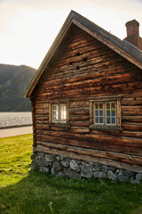 Fototapeta na wymiar Hol Priest House, a 19th-century log dwelling in Norway. Once a meeting place before church service, it stands as a historical testament in the heart of Hol.