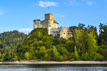 Fototapeta na wymiar Dunajec Castle in the village of Niedzica-Zamek, rising above Lake Czorsztyńskie, Poland.