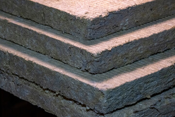 Stacked thermal insulation material, rock wool. Thermal roof insulation layer. Mineral wool or...