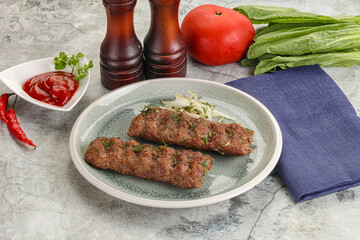 Kebab with beef served onion