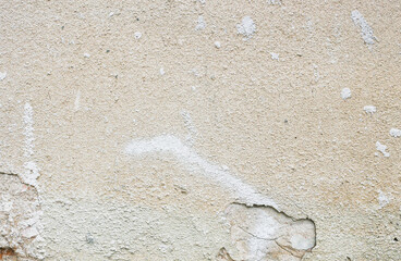 Fototapeta na wymiar Fragment of an old abandoned wall.