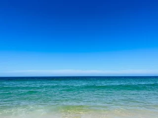 Fototapeten Pure blue sea horizon, blue seascape background, clear sky © Oksana