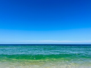 Pure blue sea horizon, blue seascape background, clear sky