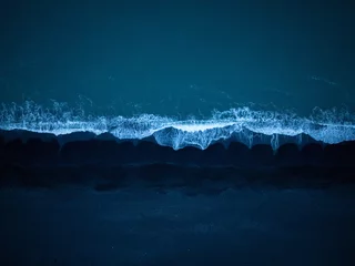  Majestic view of dark blue ocean waves splashing black sand beach, aerial top down shot. Dynamic background and natural beauty concepts. © 24K-Production