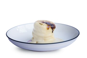 Close-up Japanese style pancake dessert topped with Creme Brulee isolated on white background.