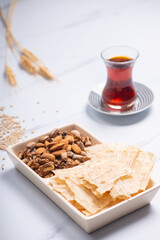 Tarhana chips, Turkish snack made with flour, wheat berries, mint, yogurt and spices also known as frik