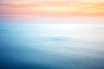Naklejka na ściany i meble Abstract Sea Surface with Blurred Motion, Ocean Water Background in Pastel Sunset Colors