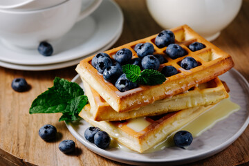 Viennese waffles with blueberries.