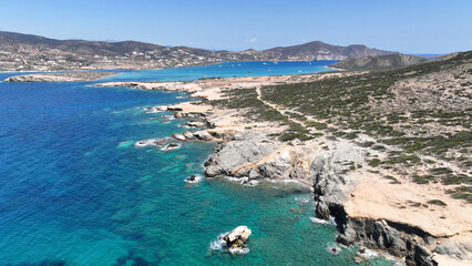 Aerial drone photo of beautiful nature and paradise secluded beaches of small island of Despotiko known for archaeological site untouched by tourism, Antiparos island, Cyclades, Greece