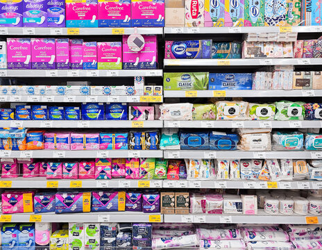 LATVIA, RIGA, 08, JANUARY,  2024: Shelves with feminine hygiene products from different manufacturers in Rimi hypermarket, Riga. Latvia