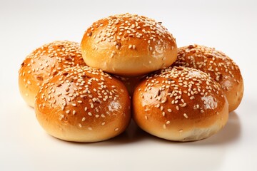Obraz na płótnie Canvas Bread buns isolated on transparent background, freshly baked bread buns with sesame seeds over white background, baking, fresh pastry, and bakery concept